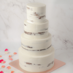 four tier half masked wedding cake