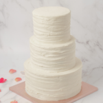 three tier ruffled wedding cake